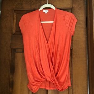 Peach deep v-neck t-shirt.
